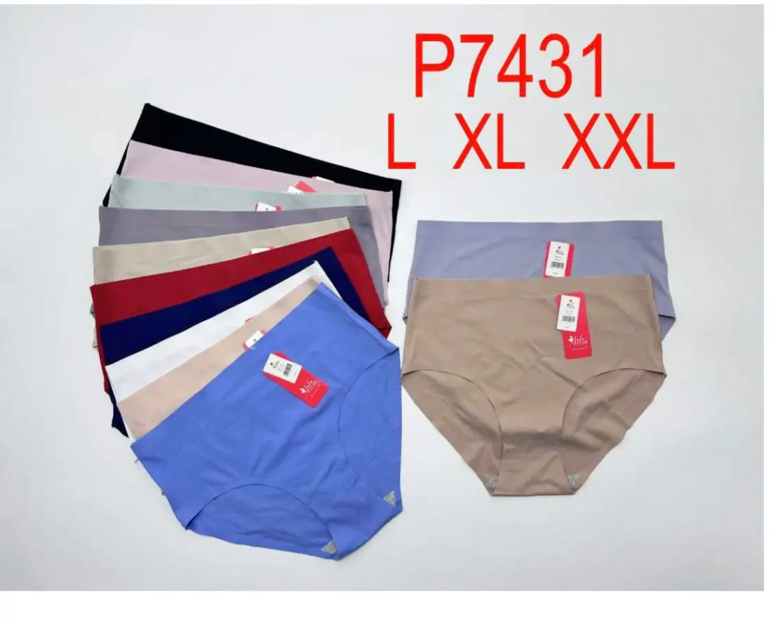 Panty reductor moldeador sin costuras en varios colores, tallas L, XL y XXL, exhibidos doblados en pila y dos desplegados sobre superficie clara.