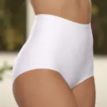 Panty reductor blanco de talle alto con ajuste firme, cubriendo el abdomen bajo y moldeando la silueta de perfil.