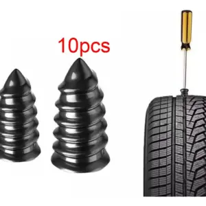 Set de clavos de goma negros en forma de espiral con dos tamaños diferentes y destornillador instalado en una llanta de carro