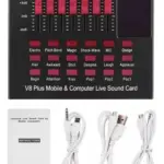 Tarjeta de sonido V8 Plus negra con controles y botones rojos, incluye manual de instrucciones y tres cables blancos de conexión.