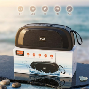 Parlante portátil Bluetooth BS-173 negro FVO sobre su caja blanca, con conectividad BT, USB, TF, FM y AUX en un entorno de playa.