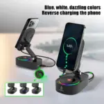 Base cargadora inalámbrica para celular con parlante, soporte ajustable y luces LED RGB multicolores en la base negra.