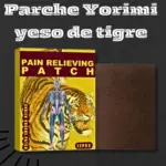 Caja amarilla con diseño de tigre y esqueleto humano, marca Pain Relieving Patch, y un parche marrón texturizado al lado.