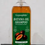 Botella de un litro de champú capilar enriquecido con aceite natural de batana