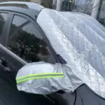 Protector térmico plateado acolchado para parabrisas de auto con funda reflectiva para el espejo retrovisor.