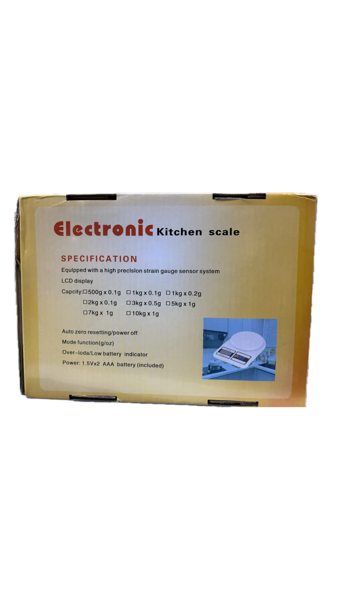 Caja dorada de báscula gramera digital para cocina con de la balanza blanca y especificaciones técnicas impresas en el frente.