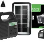 Kit solar portátil negro GDLITE GDB017 MK II con panel solar, lámpara con asa, puertos USB y bombillos LED para iluminación y carga de móviles.