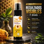 Spray Tag Recede removedor de verrugas con veneno de abeja, envase negro de 30 ml sobre fondo de panales de miel y hojas verdes.