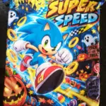 Bolsa de tela con cordón para dulces con diseño de Sonic el Erizo, calabazas, fantasmas y anillos dorados en colores azul y naranja vibrantes.