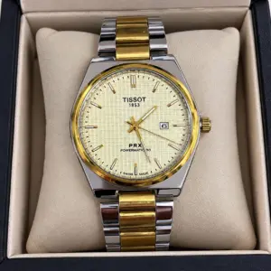 Reloj Tissot PRX Powermatic 80 de acero y oro con esfera texturizada dorada y fechador en estuche beige