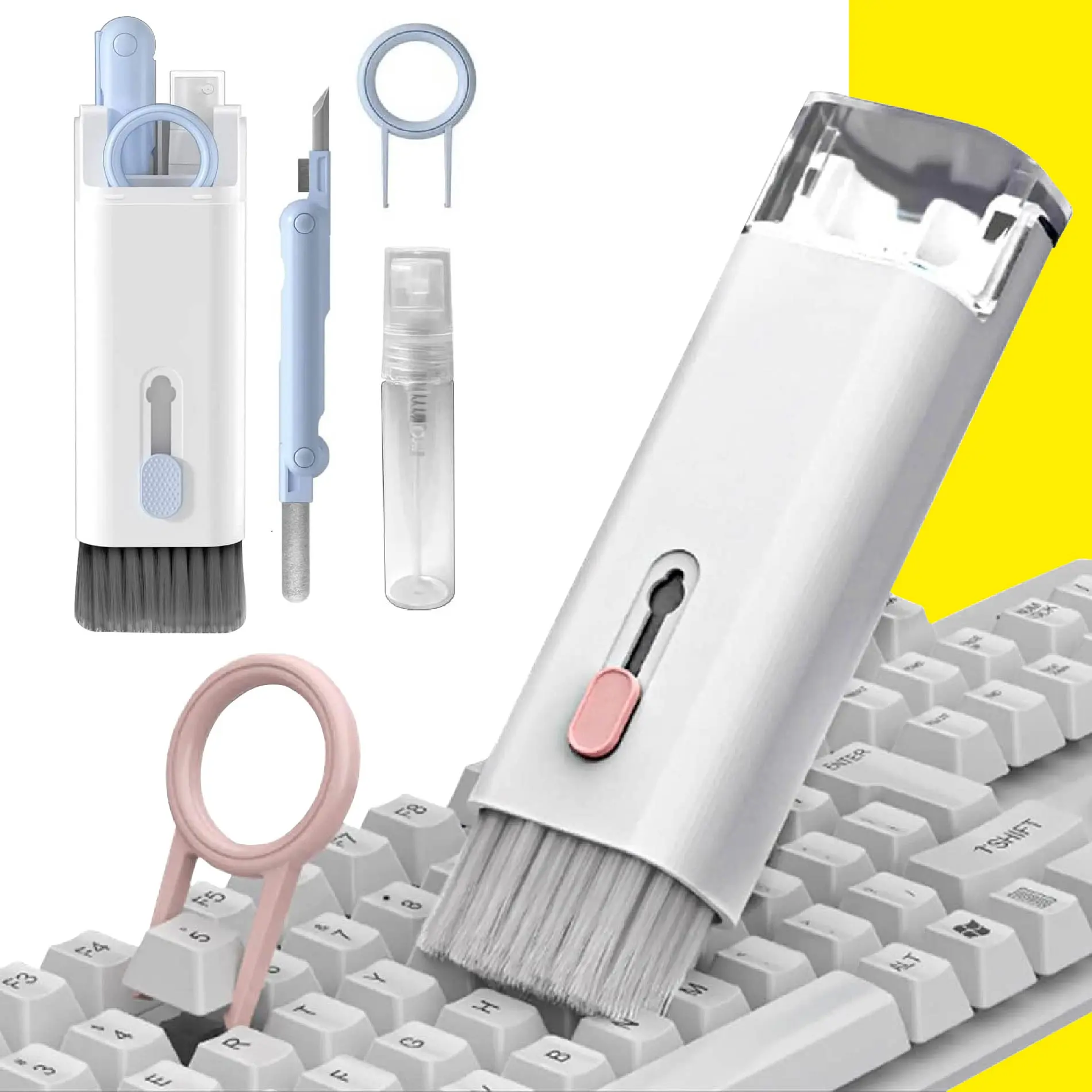 Kit limpiador 7 en 1 blanco para teclado y audífonos, incluye cepillo retráctil, spray, herramienta para teclas y accesorios en estuche.