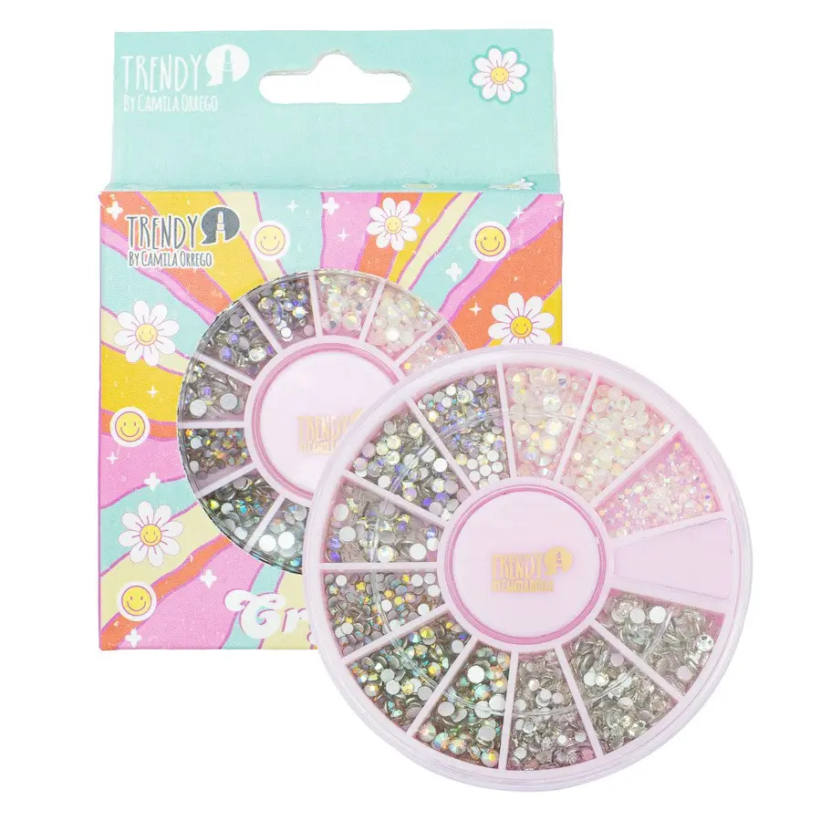 Paleta circular rosa con diversos cristales brillantes e iridiscentes y empaque decorado con motivos retro de margaritas y colores pastel.