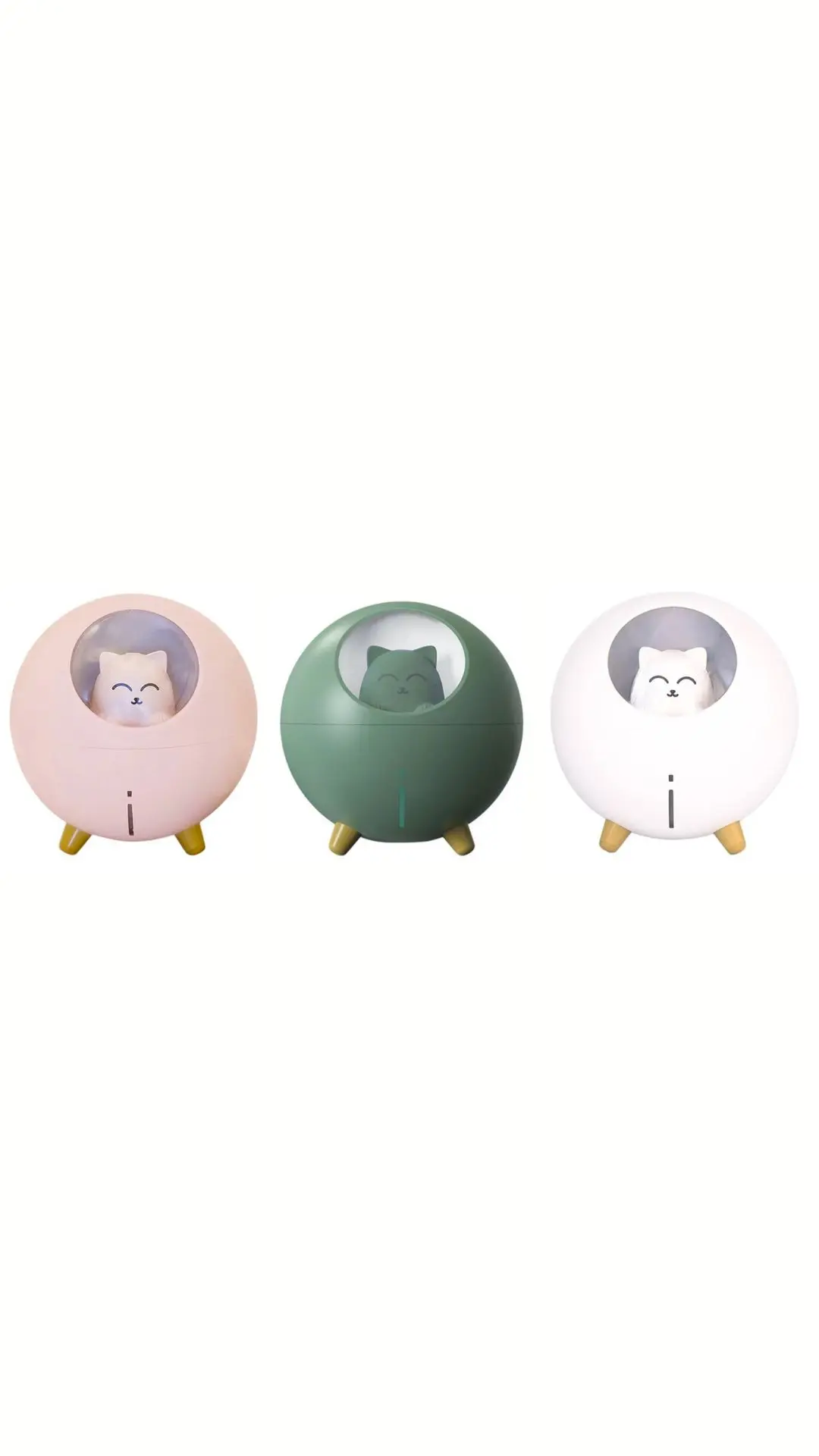 Tres humidificadores portátiles en colores rosado, verde y blanco con diseño redondo de gato, luz nocturna y patas de apoyo.