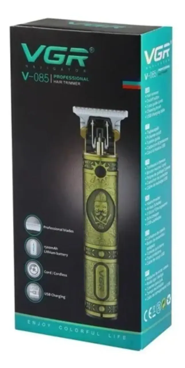 Empaque de la cortadora de cabello profesional VGR V-085 con diseño dorado ornamentado, cuchilla plateada y detalles en turquesa.