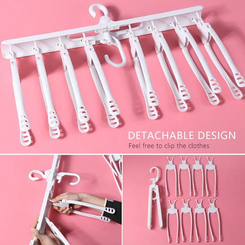 Colgador plástico blanco de ocho ganchos desmontables, con diseño plegable y un gancho giratorio superior sobre fondo rosado.