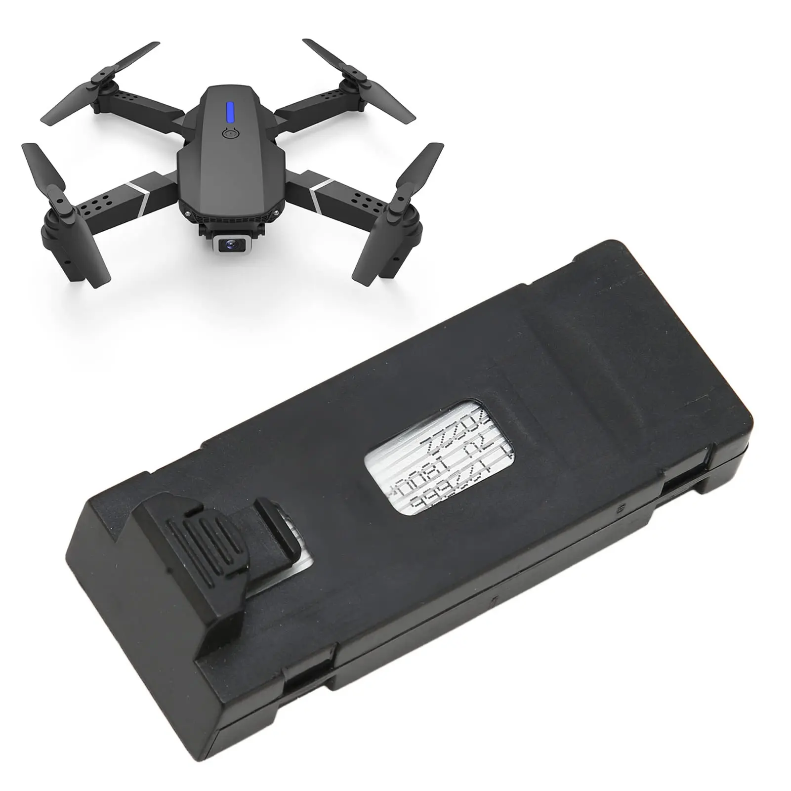 Batería de repuesto negra para dron plegable gris, con conector de pestillo y etiqueta plateada visible.