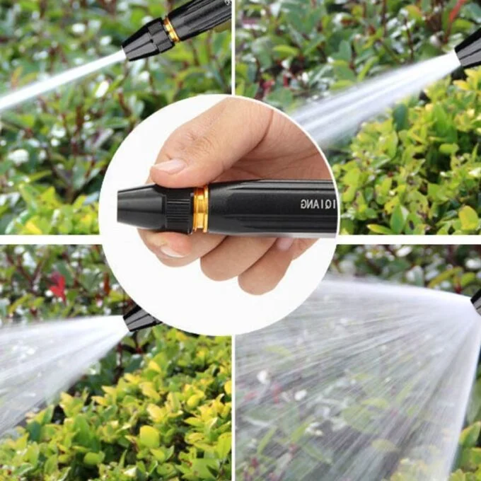 Boquilla de manguera de alta presión en color negro con detalle dorado, utilizada para rociar agua en plantas y exteriores mediante diferentes chorros.