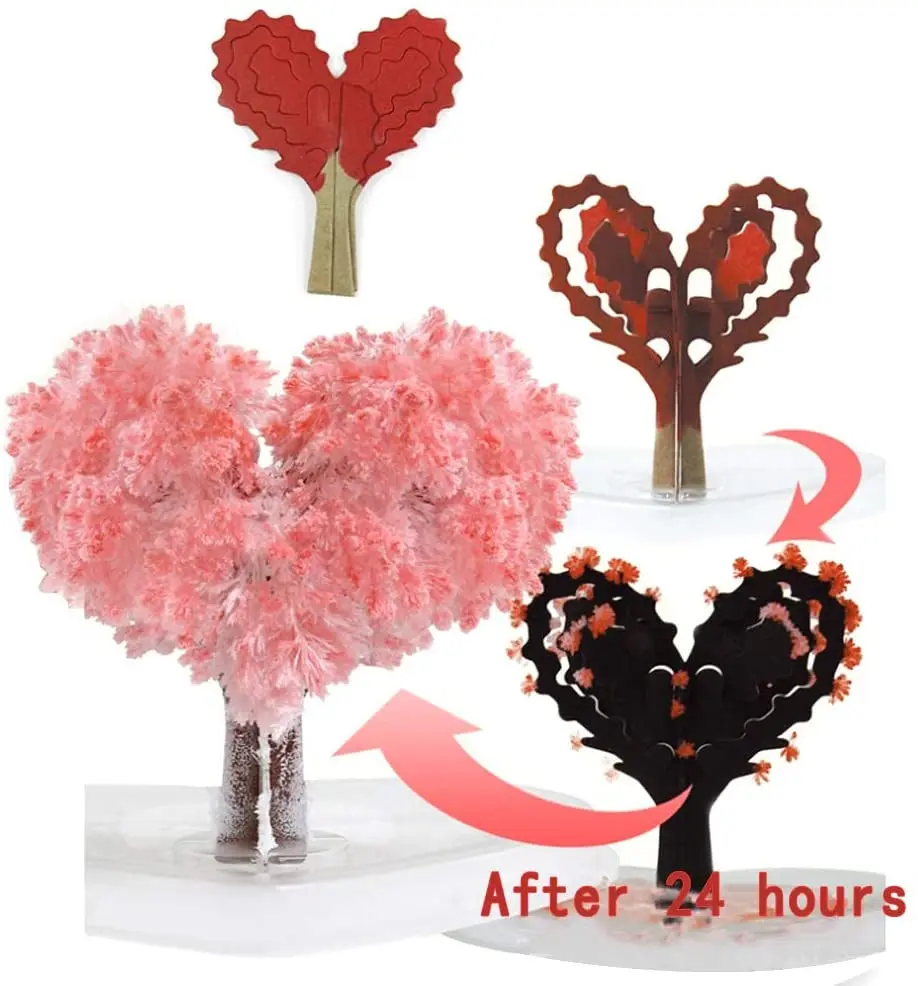 Set x2 Árbol Mágico del Amor con cristales en proceso de crecimiento, uno marrón y otro cubierto de cristales rosados florecidos.