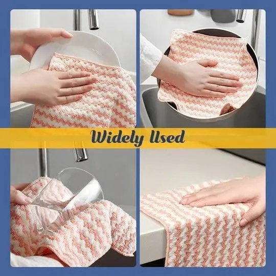 Paño de limpieza de microfibra blanco y rosado con diseño en zigzag, usado para lavar platos, ollas, vasos y secar mesones de cocina.