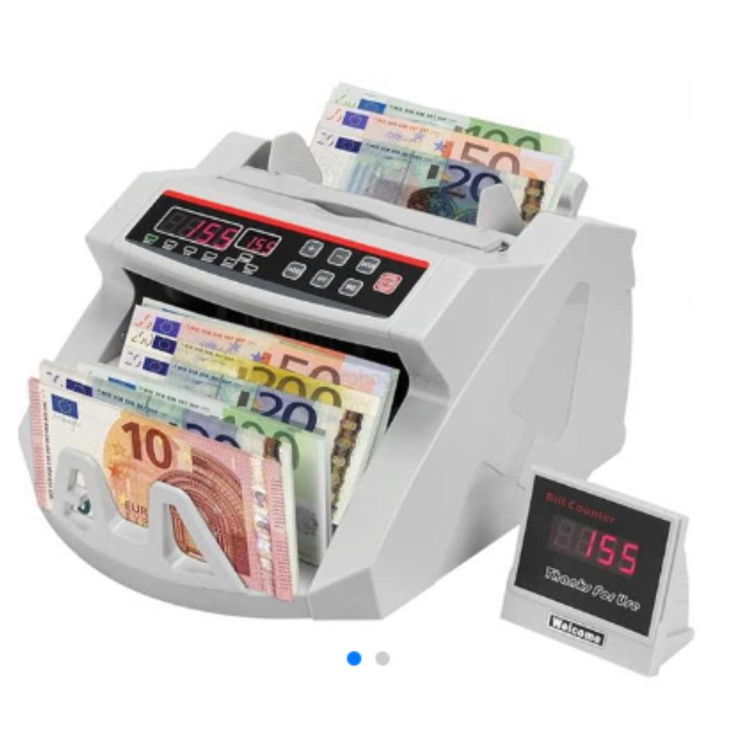 Contadora de billetes blanca con pantalla digital y monitor externo, procesando billetes de euro en ángulo lateral.