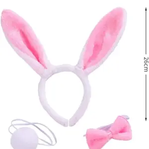Set de accesorios para disfraz de coneja en peluche rosa y blanco: diadema de 26x28cm, cola con cordón y corbatín.