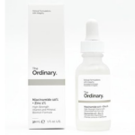 Caja blanca y frasco gotero de The Ordinary Niacinamide 10% + Zinc 1% de 30 ml para imperfecciones sobre fondo blanco.