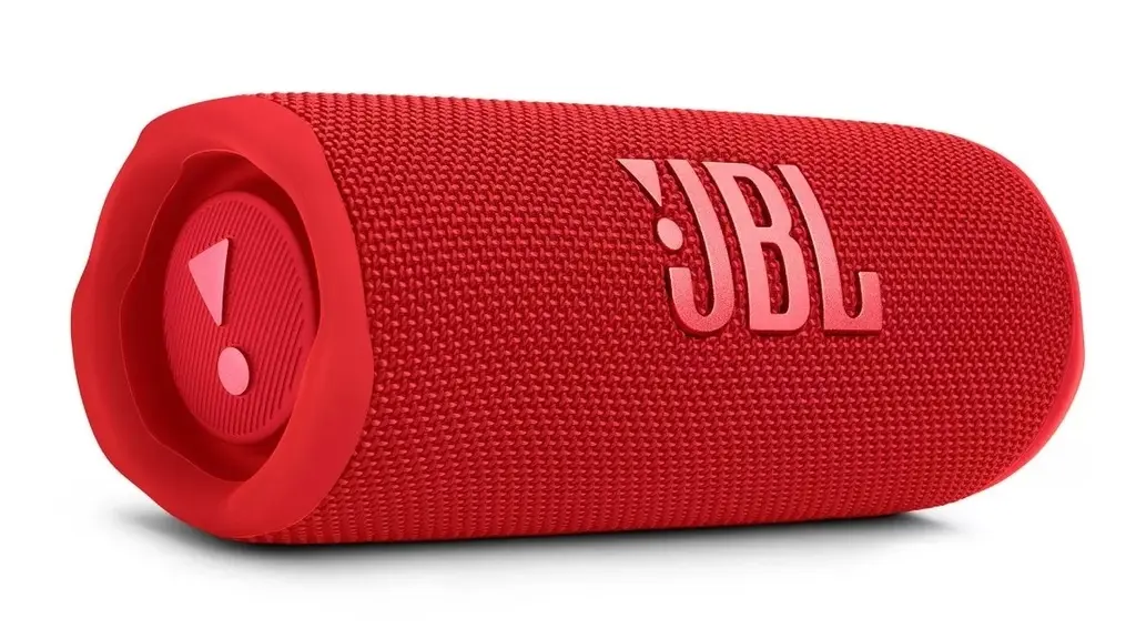 Parlante JBL Flip 6 inalámbrico en color rojo con revestimiento de tela texturizada y radiador pasivo lateral visible en primer plano