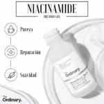 Sérum facial Niacinamida 10% y Zinc 1% de The Ordinary en frasco de vidrio esmerilado con gotero, junto a platos de vidrio y gotas transparentes.