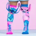 Set de dos medias altas infantiles, una rosa con Stitch y otra azul con Ángel, ambas con orejas de peluche 3D.