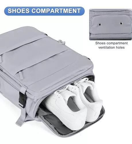 Mochila gris de viaje con compartimiento inferior independiente para zapatos y aberturas de ventilación metálicas.