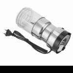 Licuadora y trituradora eléctrica 2 en 1 compacta con vaso transparente, cuerpo plateado, base negra y cable de alimentación, vista diagonal.