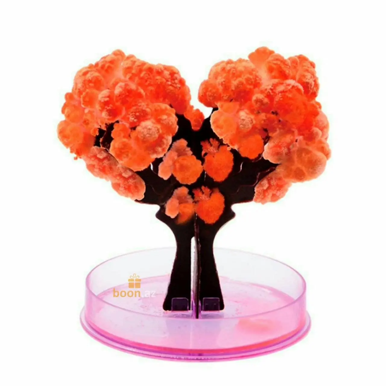 Kit de cultivo con árbol de densos cristales naranja brillante, textura rugosa, troncos negros y base circular rosa.