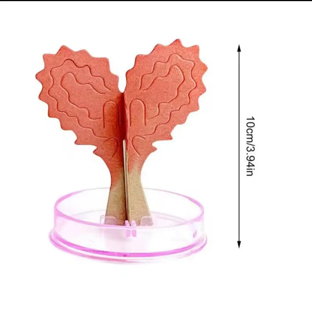 Kit de cultivo con dos piezas de hojas naranja rojizo con relieve y base circular rosa transparente, de 10 cm de altura.