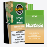 Vaper desechable verde y beige Hyve x Vapetasia Honeydew Kream de 5000 puffs con envase y advertencia de nicotina.