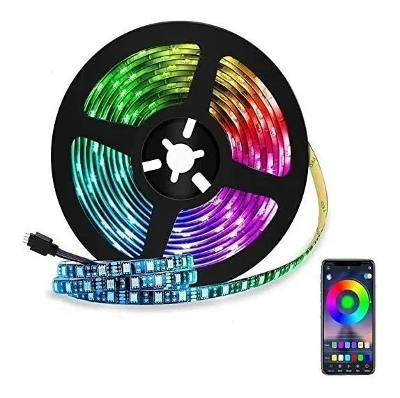 Carrete de cinta LED RGB multicolor con tramo desenrollado de luces azules y smartphone mostrando la aplicación de control por Bluetooth.