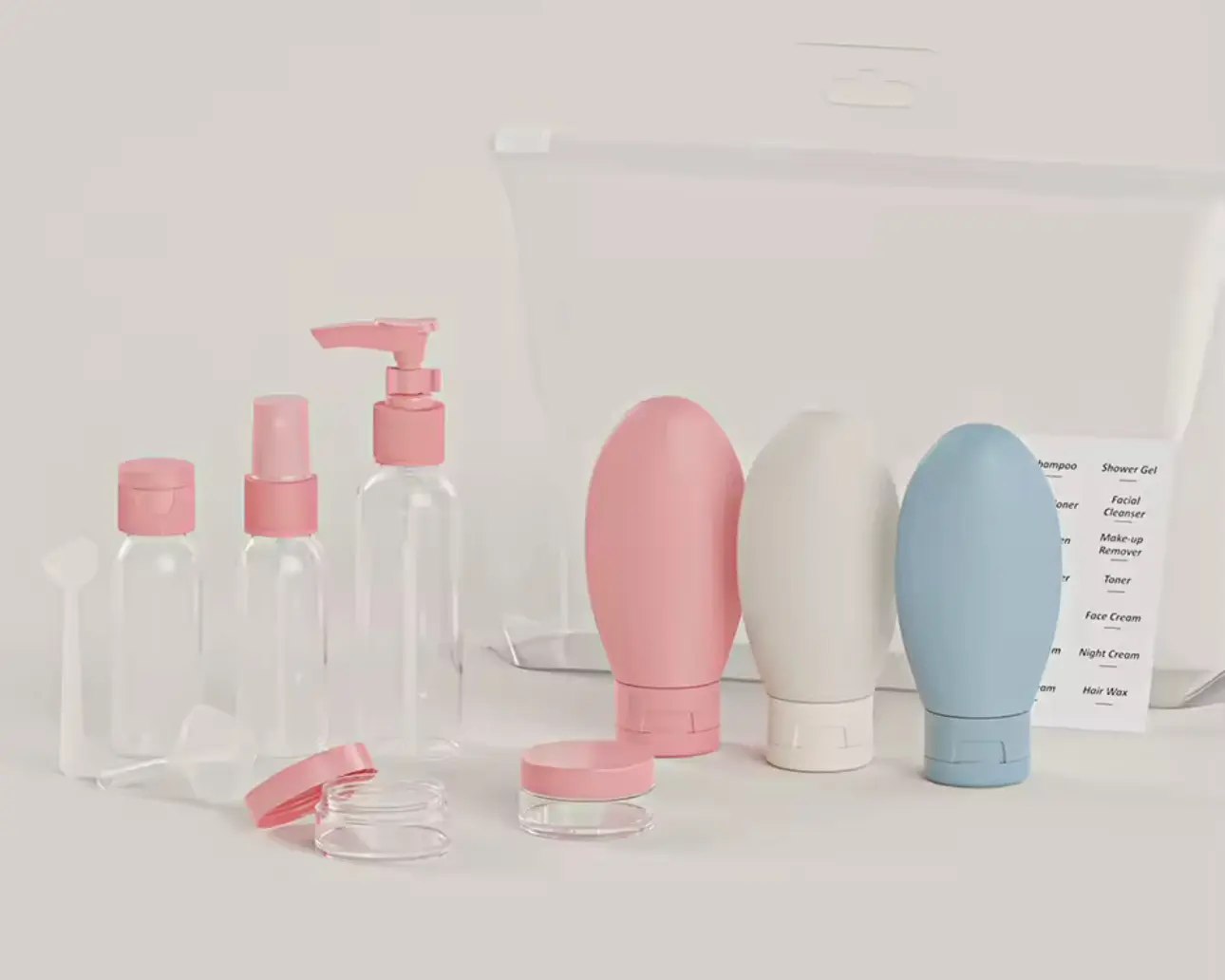 Set de viaje de 11 piezas con botellas transparentes, frascos de silicona rosa, blanco y azul, y estuche impermeable para organizar artículos de aseo.