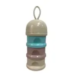 Dispensador de leche para bebés con tres compartimentos apilables en colores azul, malva y crema, con tapa y asa circular para transporte.