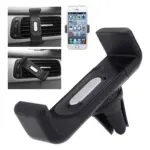Soporte negro para celular en ABS, con pinza de ventilación y botón plateado, instalado en la rejilla de aire de un vehículo.