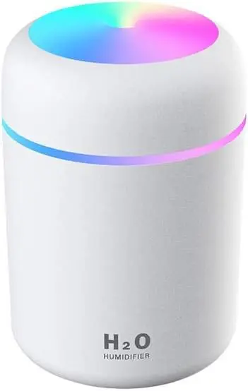 Humidificador blanco cilíndrico con luz LED RGB multicolor en la parte superior y un anillo luminoso central. Texto H2O en la base.