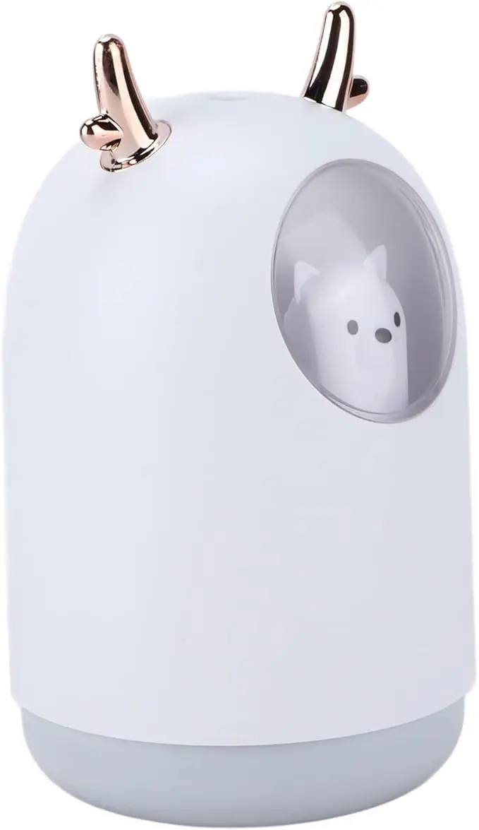 Humidificador ultrasónico blanco con diseño de oso en ventana redonda, cuernos dorados y base gris.