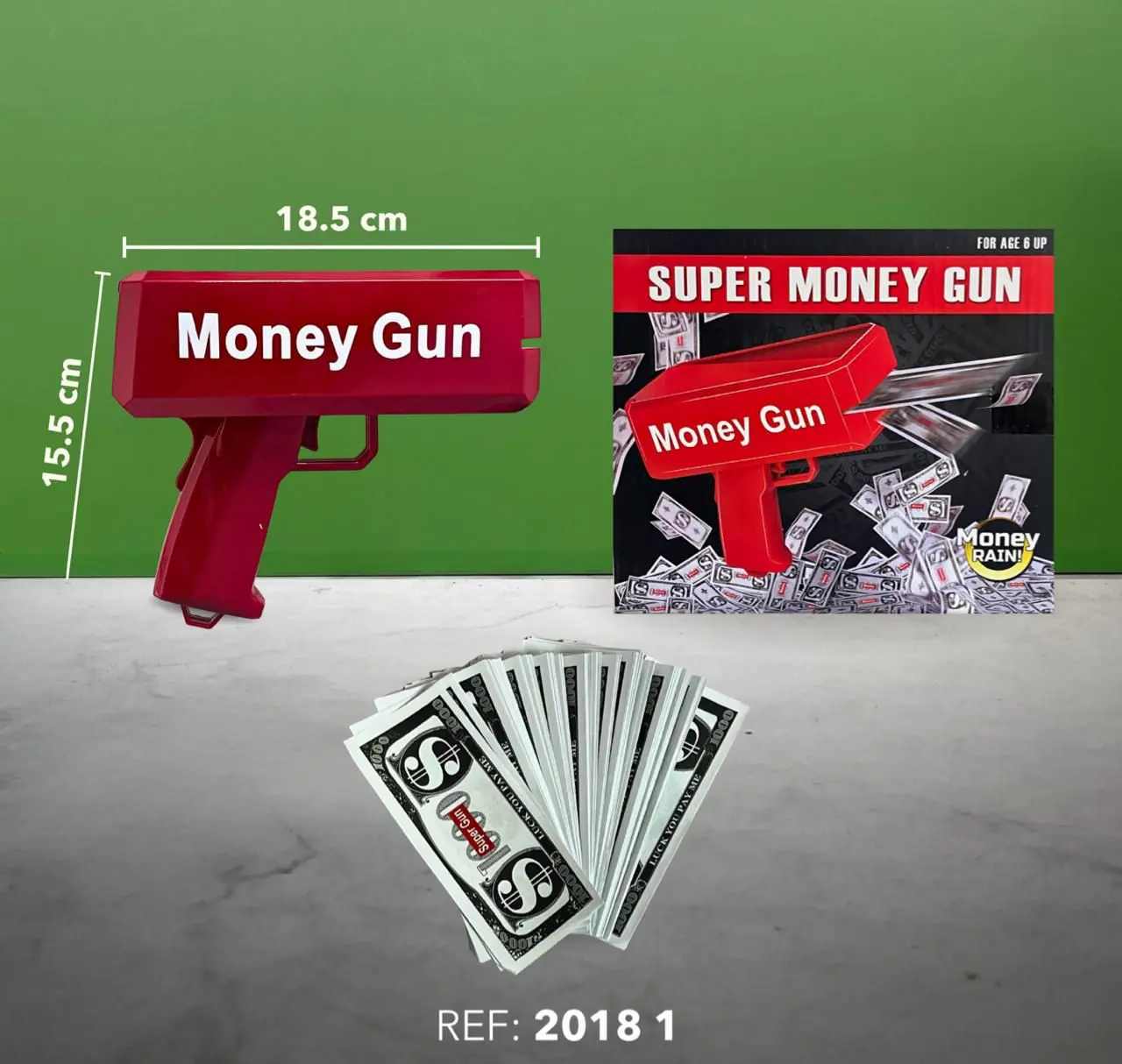 Pistola lanzadora de billetes roja de 18.5x15.5 cm con caja de empaque y fajos de dinero ficticio incluidos para fiestas.