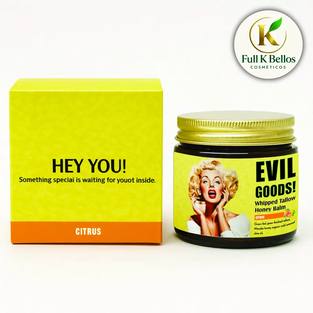 Caja amarilla con base naranja y frasco de vidrio oscuro con tapa dorada de bálsamo de miel y cebo de res Evil Goods, aroma citrus.