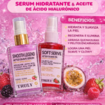 Dúo pack Truly con frascos de sérum morado y aceite rojo sobre fondo rosa con frutas, para hidratar y prevenir vellos encarnados.