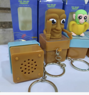 Llavero antiestres musical con figura caricaturesca para mochilas - Alivia la tension diaria de forma divertida