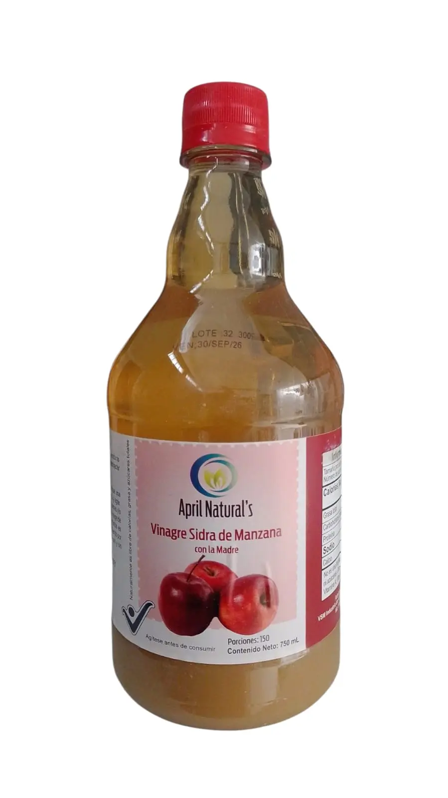 Botella de 750ml de vinagre de sidra de manzana April Natural's con la madre, líquido ámbar con sedimento en la base y tapa roja, fondo blanco.