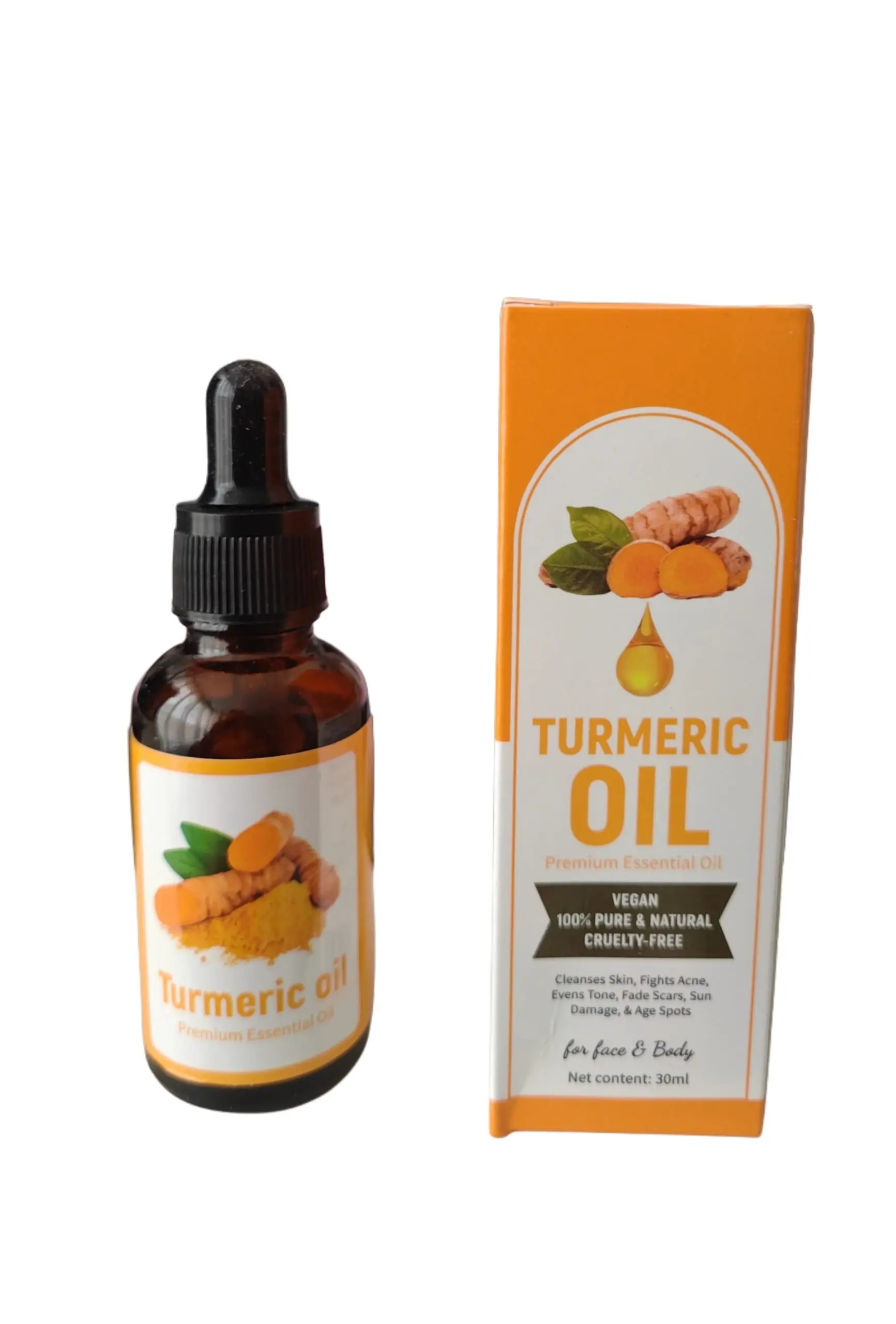 Frasco de vidrio ámbar con gotero junto a su caja naranja de aceite de cúrcuma de 30ml, diseñado para el cuidado y tratamiento de manchas en piel.