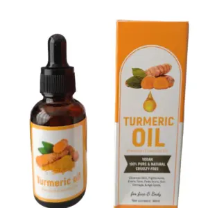 Frasco de vidrio ámbar con gotero junto a su caja naranja de aceite de cúrcuma de 30ml, diseñado para el cuidado de rostro y cuerpo.