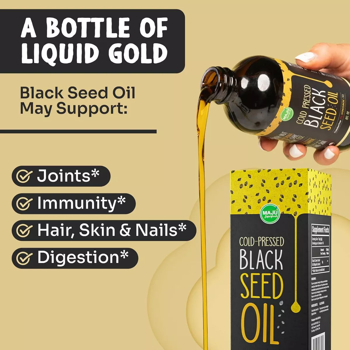 Aceite de semilla negra Maju vertiéndose desde una botella ámbar, mostrando su textura dorada junto a su empaque negro y amarillo.