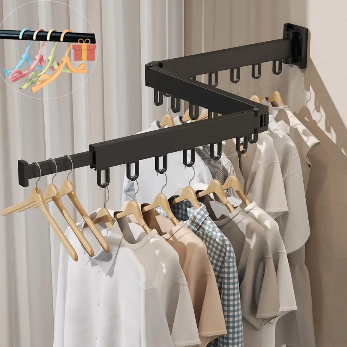 Tendedero extensible negro plegable de tres secciones montado en pared, cargado con perchas de madera y ropa organizada en una habitación.