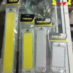 Cuatro tamaños de plafones LED rectangulares TRIMON para vehículos, con luz amarilla y blanca, empacados individualmente en bolsas plásticas transparentes.